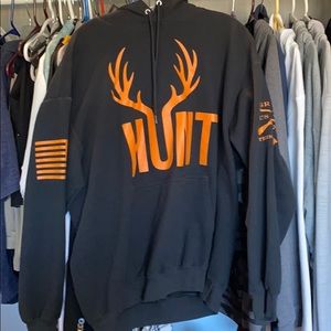 Black gruntstyle hoodie with orange HUNT lettering